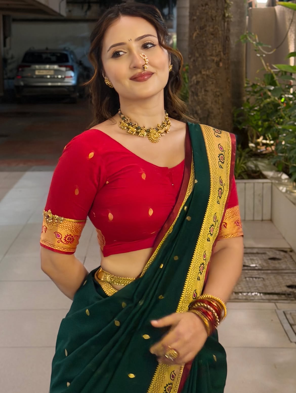 Varsha Flaunts Gold Jewelry With A Classic Saree