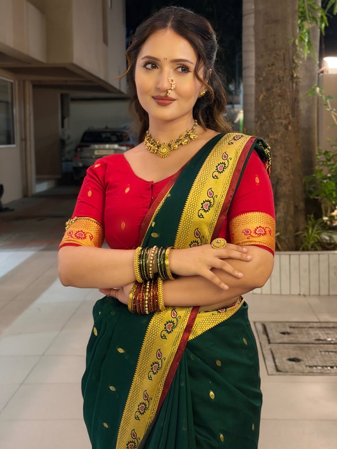 Varsha Strikes A Bold Saree Pose Outdoors