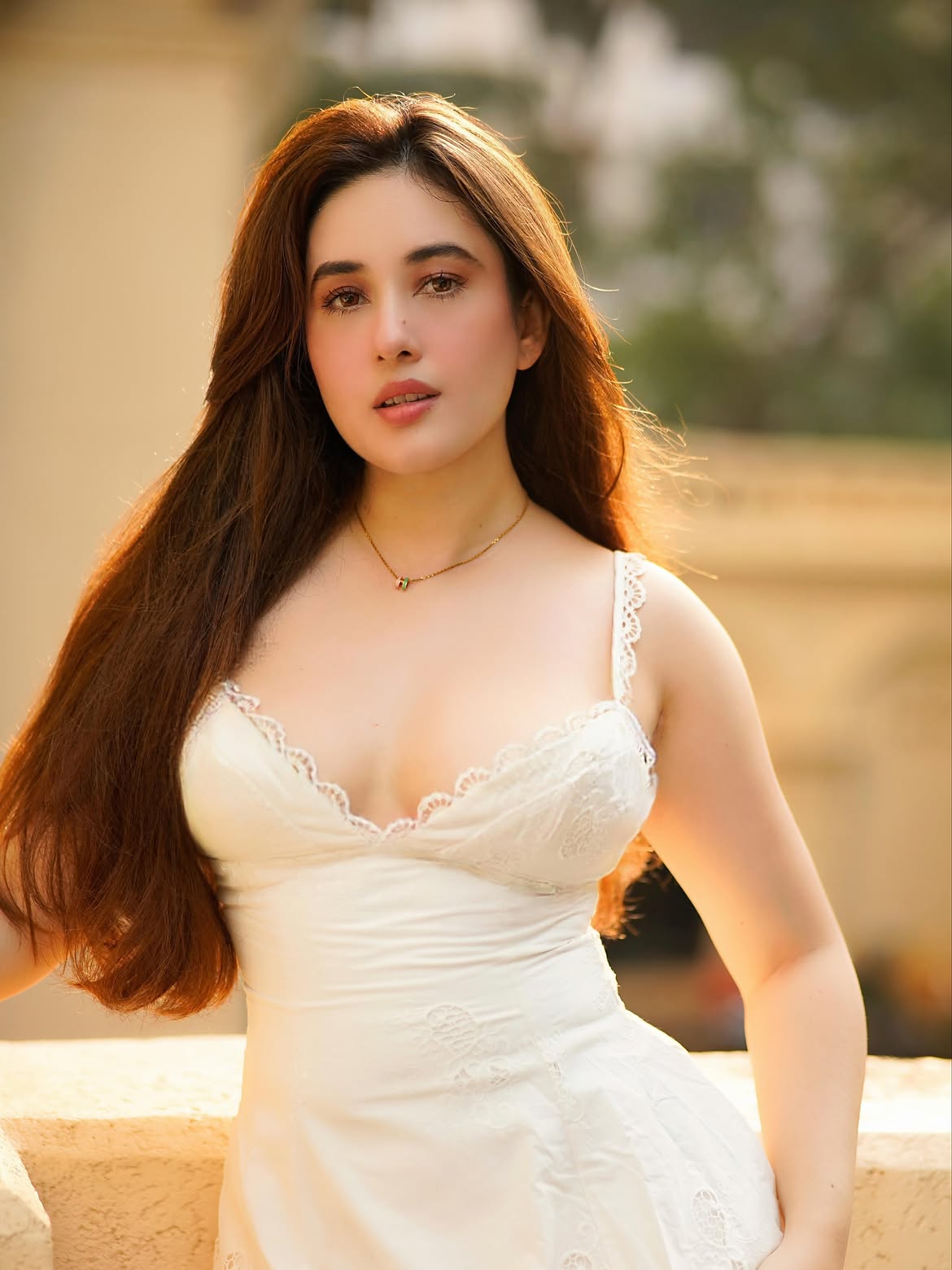 Aditi Budhathoki Poses In White With Soft Glam!!