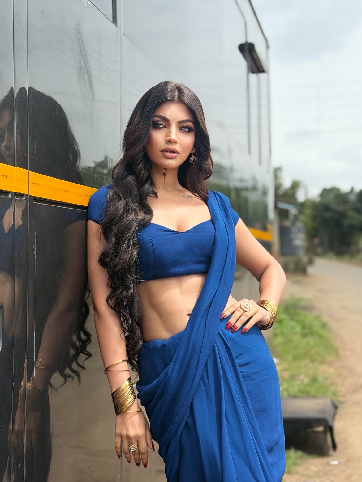 Akanksha Puri Leans Against A Black Studio Van!!