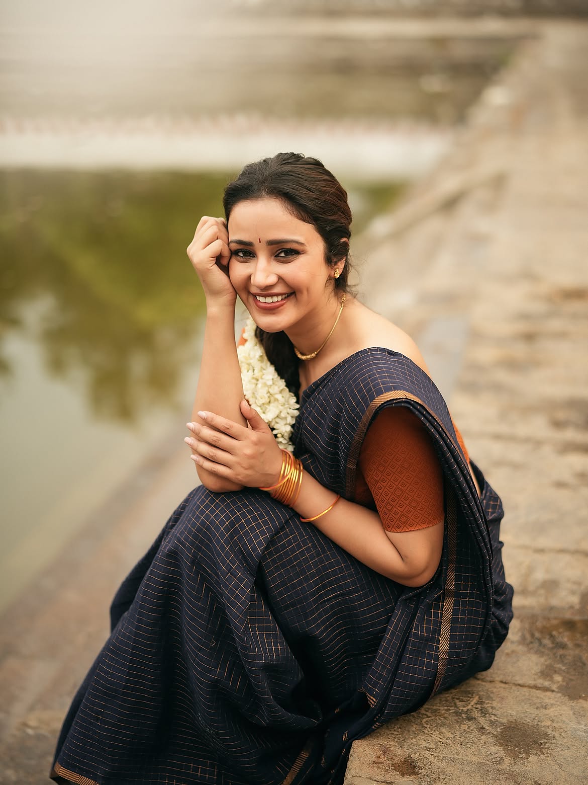 Anaira Gupta Sits Quietly By A Calm Water Edge!!
