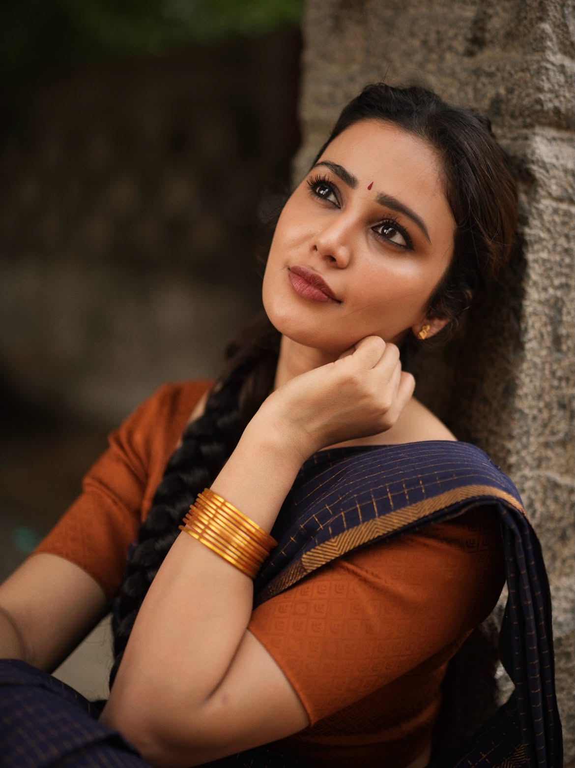 Anaira Gupta Smiles Softly In A Closeup Portrait