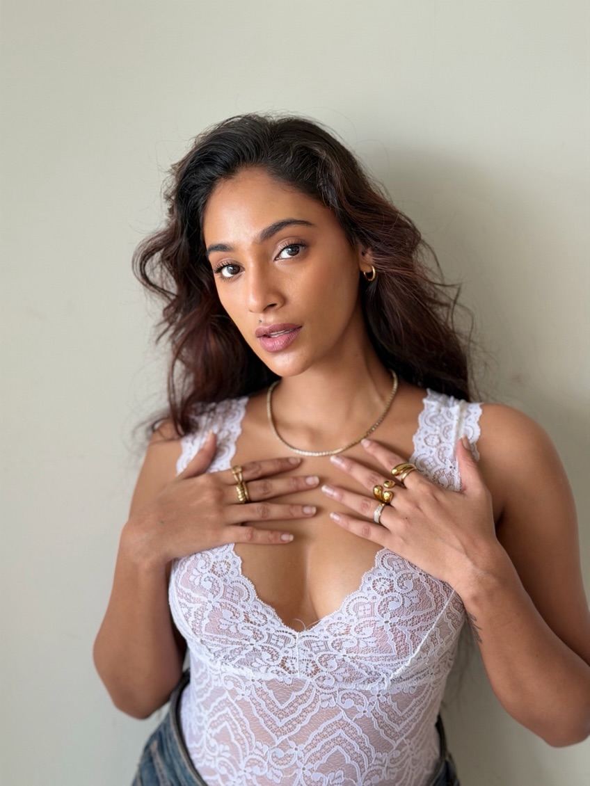 Anukreethy Vas Gives A Direct Gaze In A Lace Top