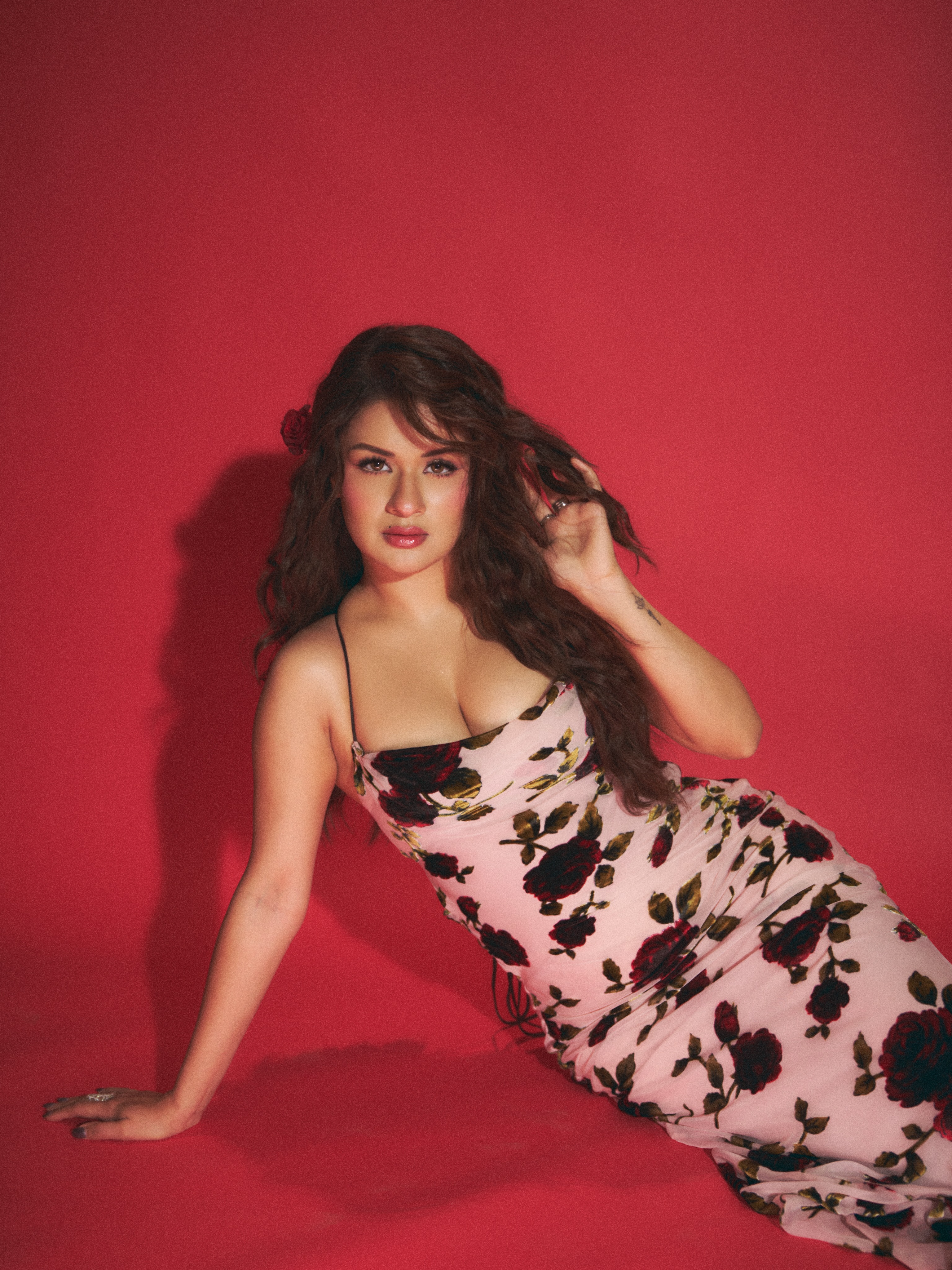 Avneet Kaur Reclines In A Pink Rose Print Dress!