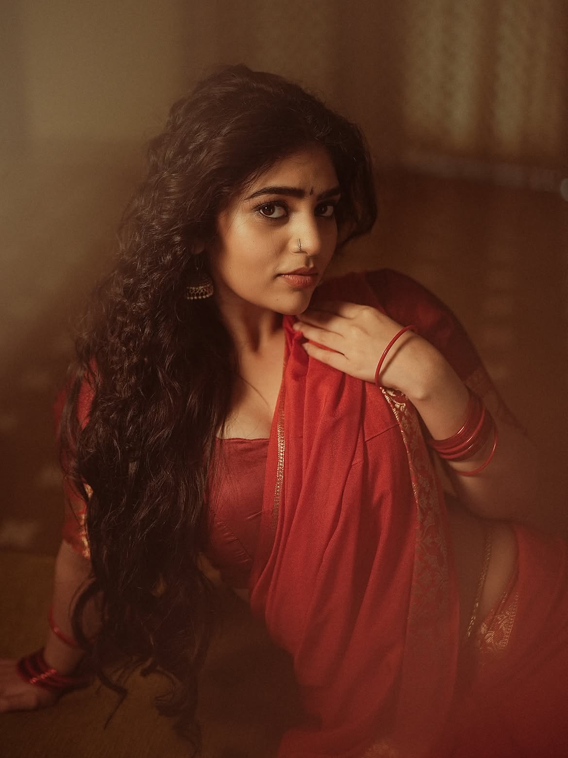 Bandhavi Sridhar Brings Soft Glam To A Red Saree