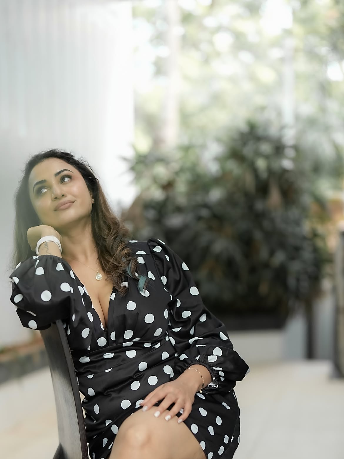 Janani Ashok Kumar Sits In A Black Polka Dot Fit