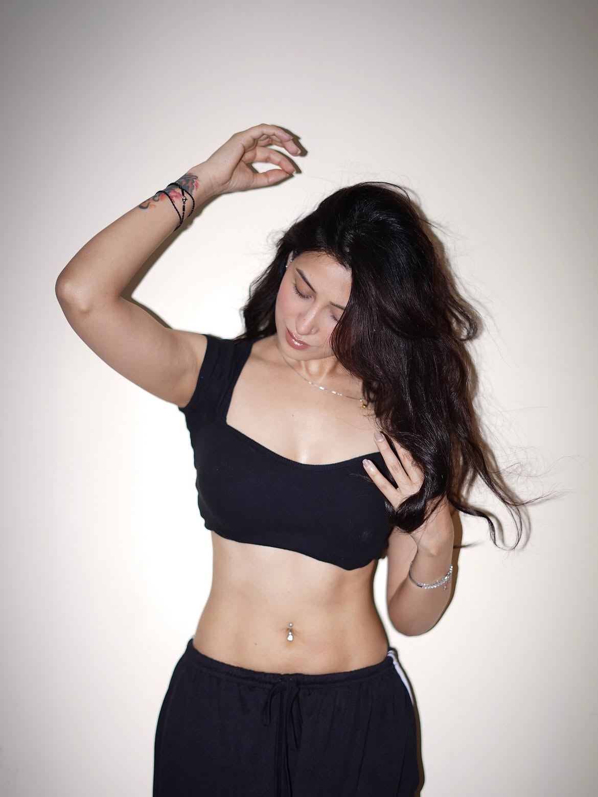 Mahira Sharma Poses In Black Crop Top And Slacks