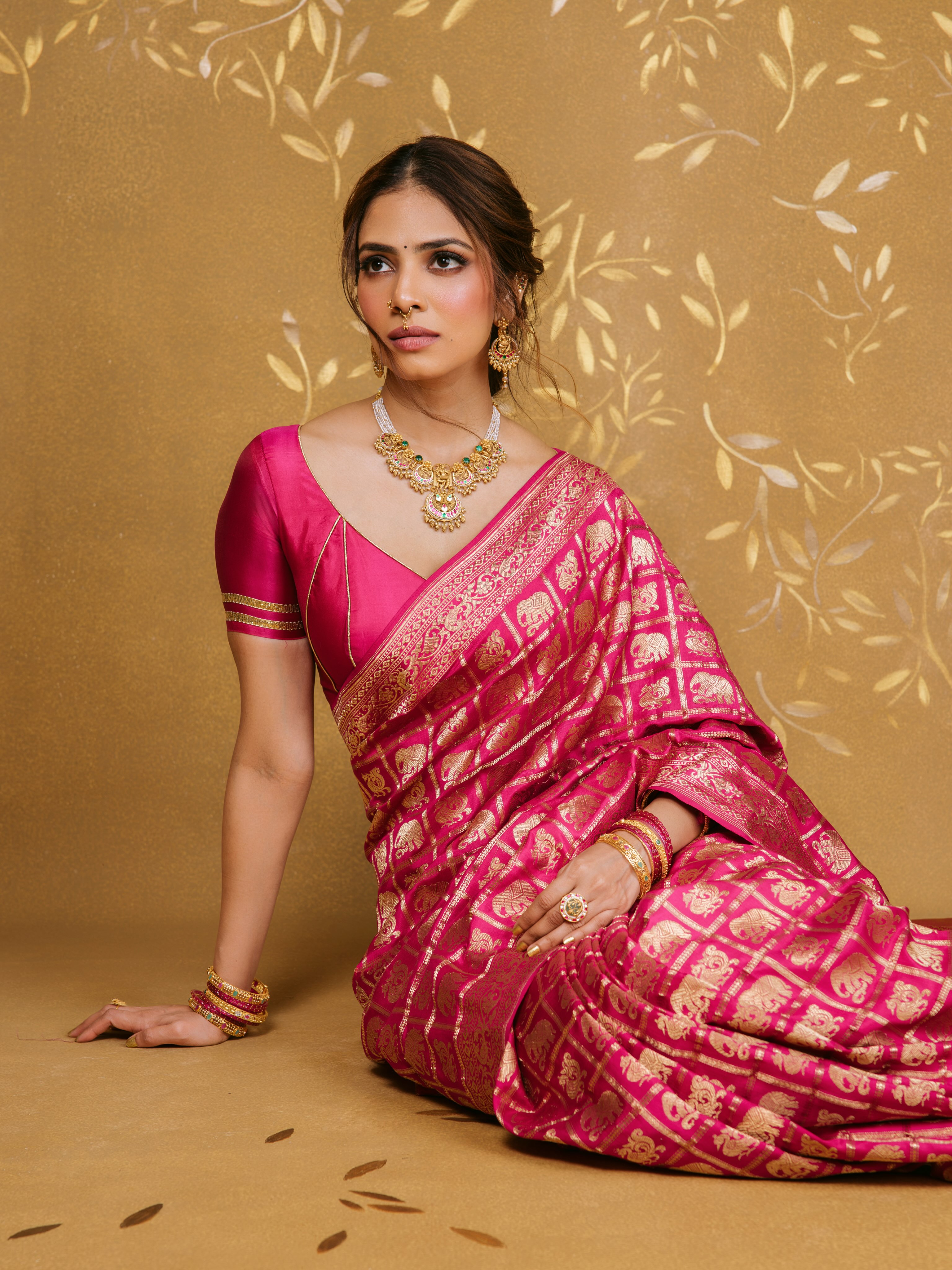 Malavika Mohanan In Pink Silk With Braided Locks