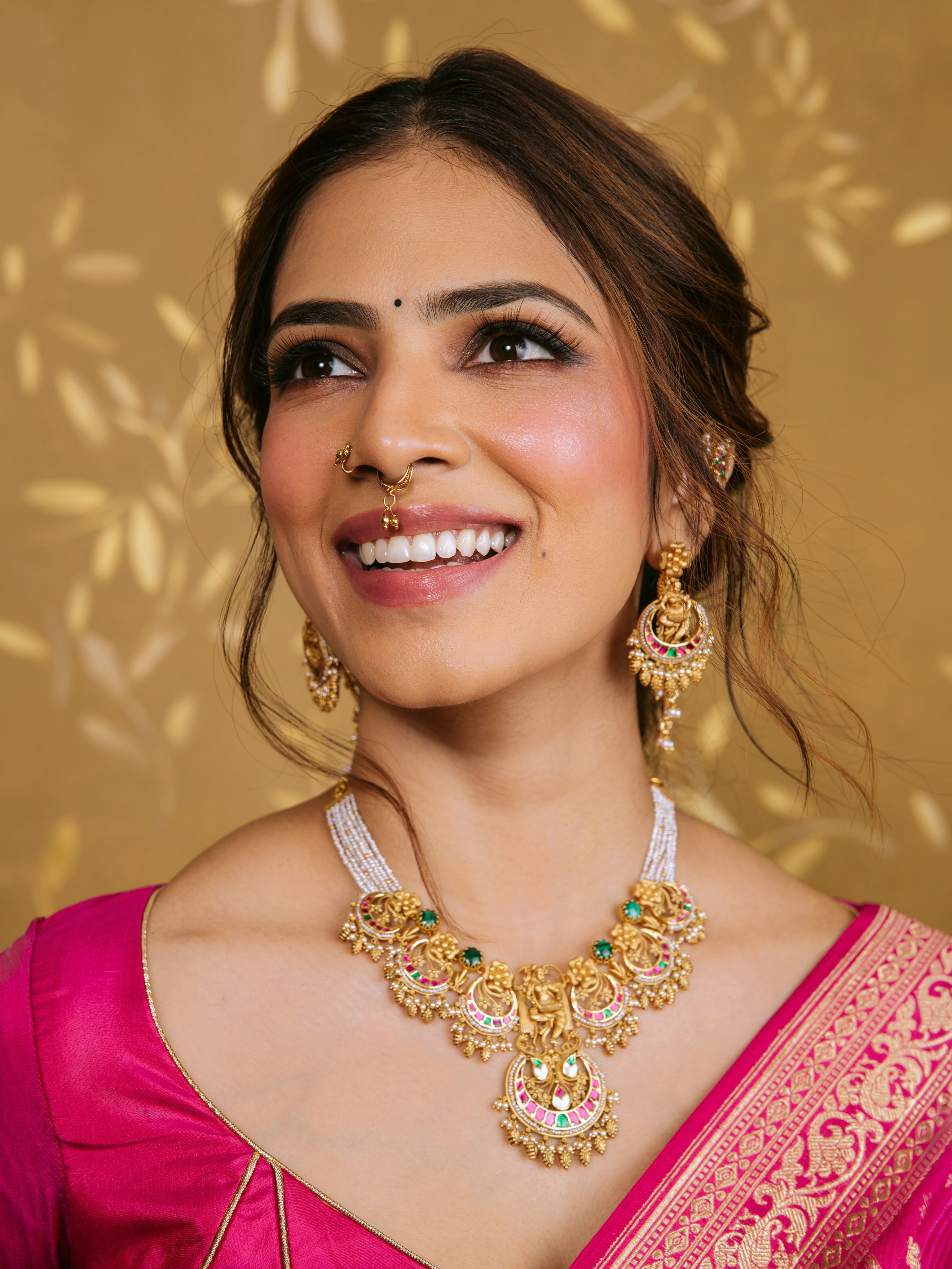 Malavika Mohanan Stands In Bold Pink Silk Saree