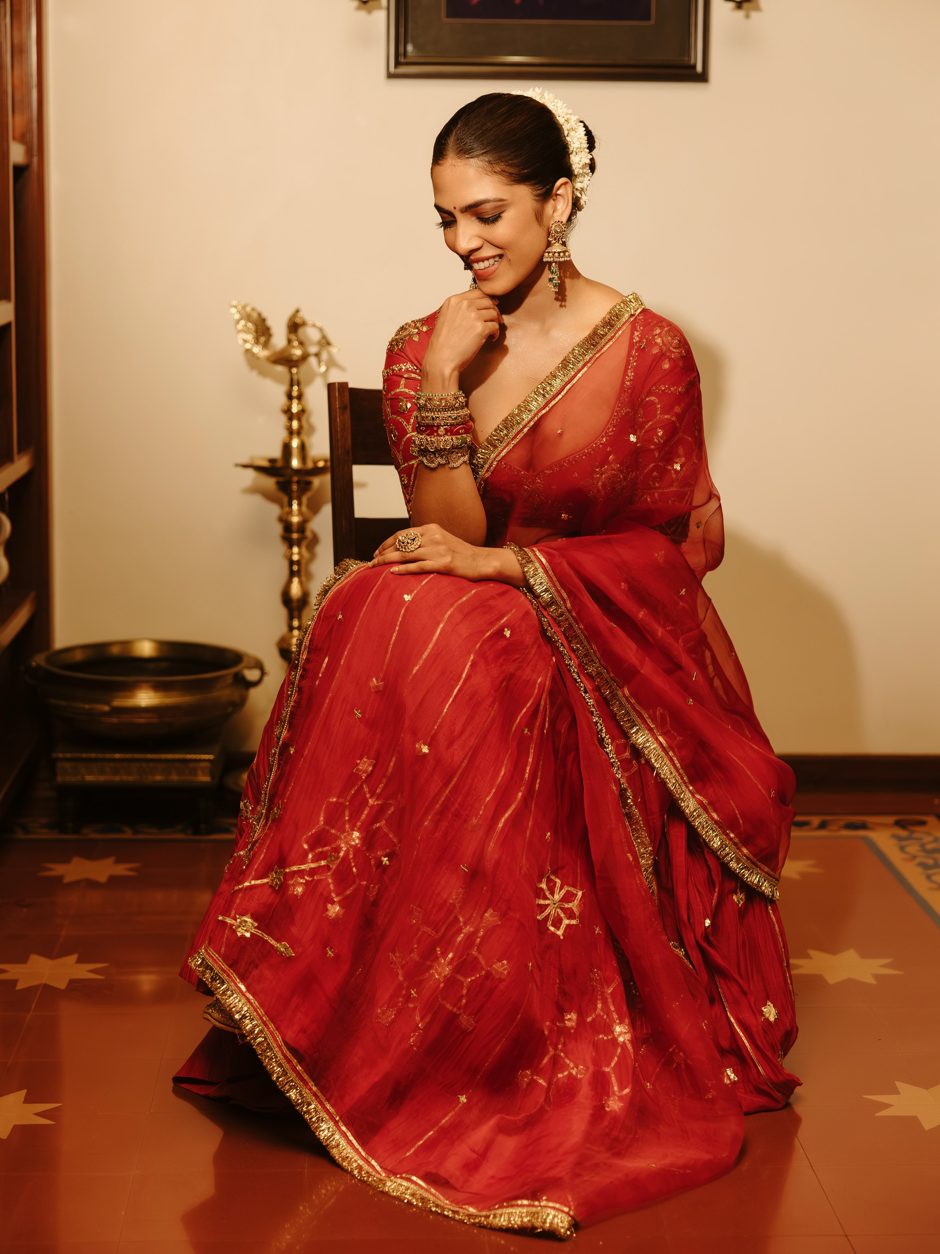 Malavika Mohanan Stuns In A Red Festive Portrait