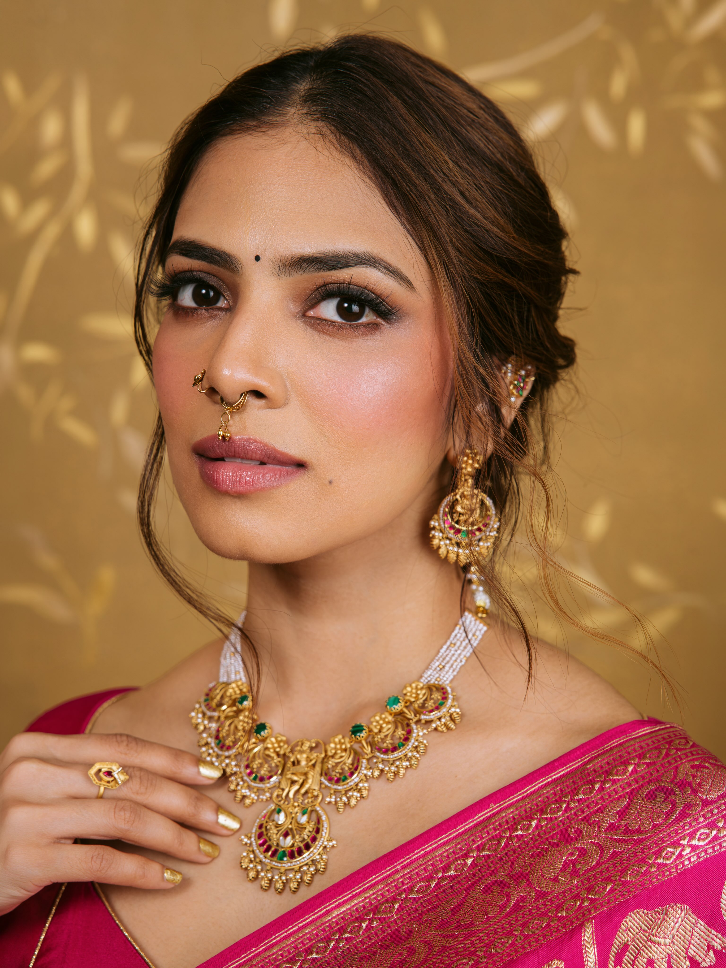 Malavika Mohanan Wears Gold Earrings And A Bindi