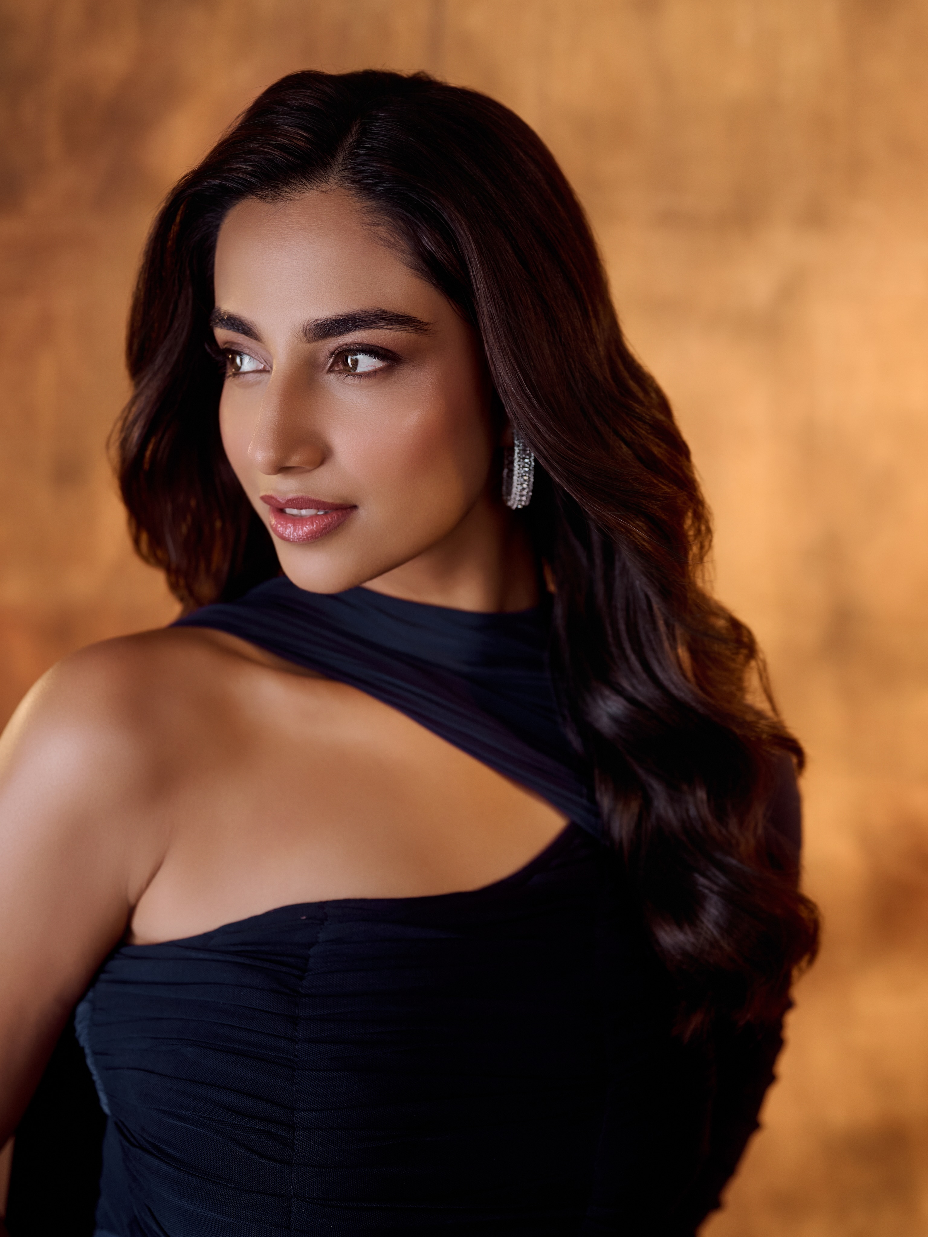 Meenakshi Chaudhary Shows Her Dark Wavy Hair