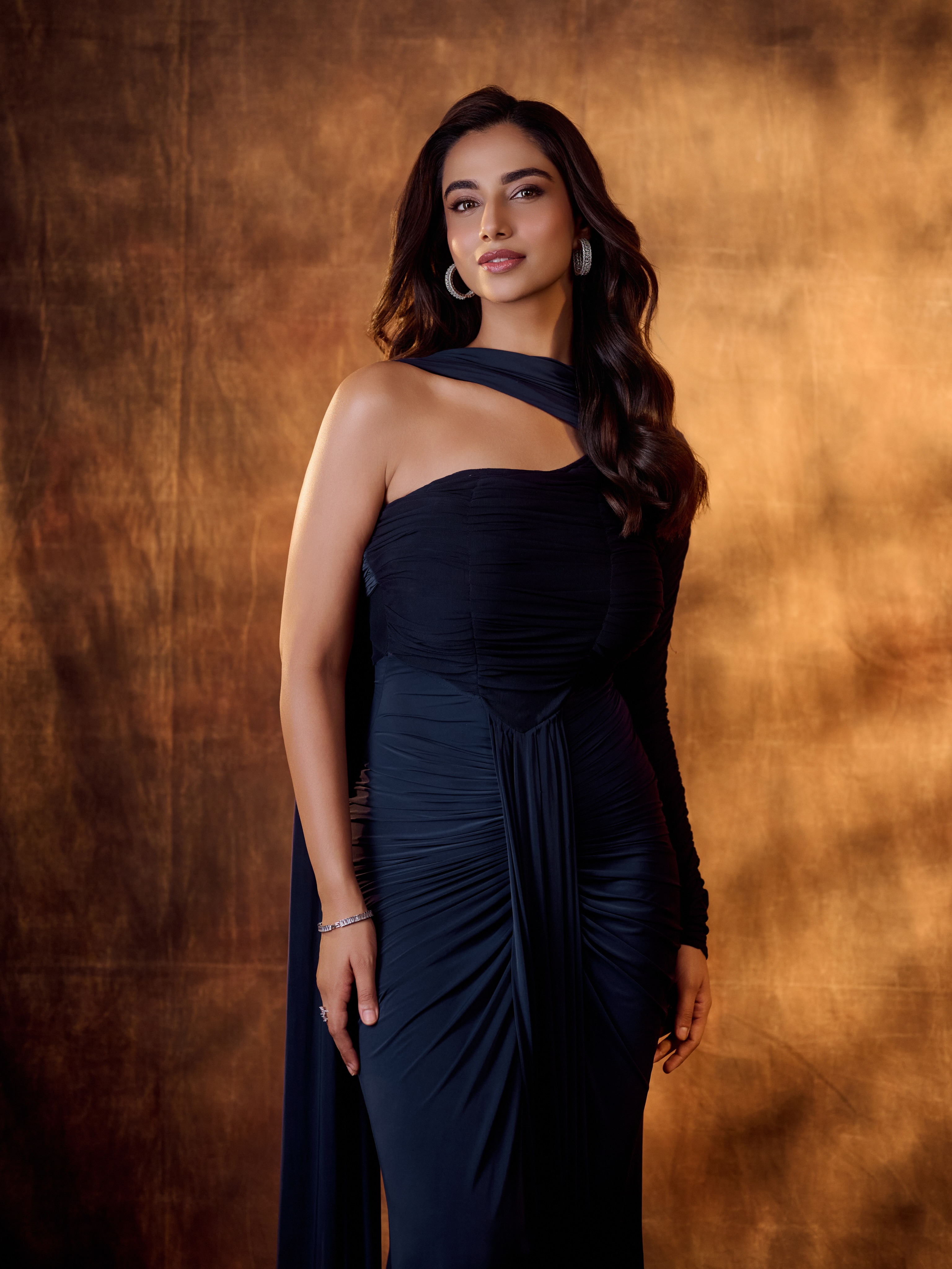 Meenakshi Chaudhary Wears A Chic Asymmetric Gown
