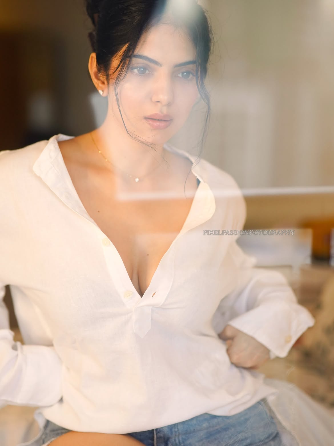 Misha Narang Poses Behind Sheer Net In White Top