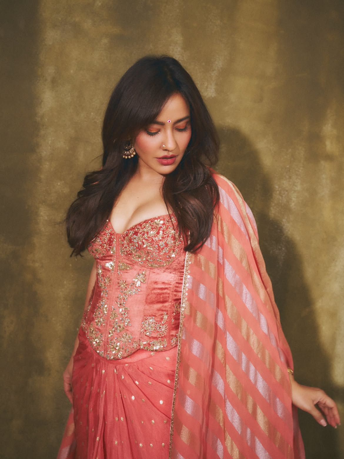 Neha Sharma Reclines In A Pink Festive Ensemble!