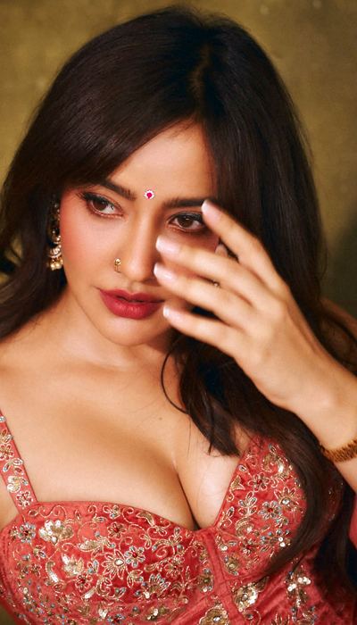 Pics: Neha Makes Coral Pink Look Bold And Regal