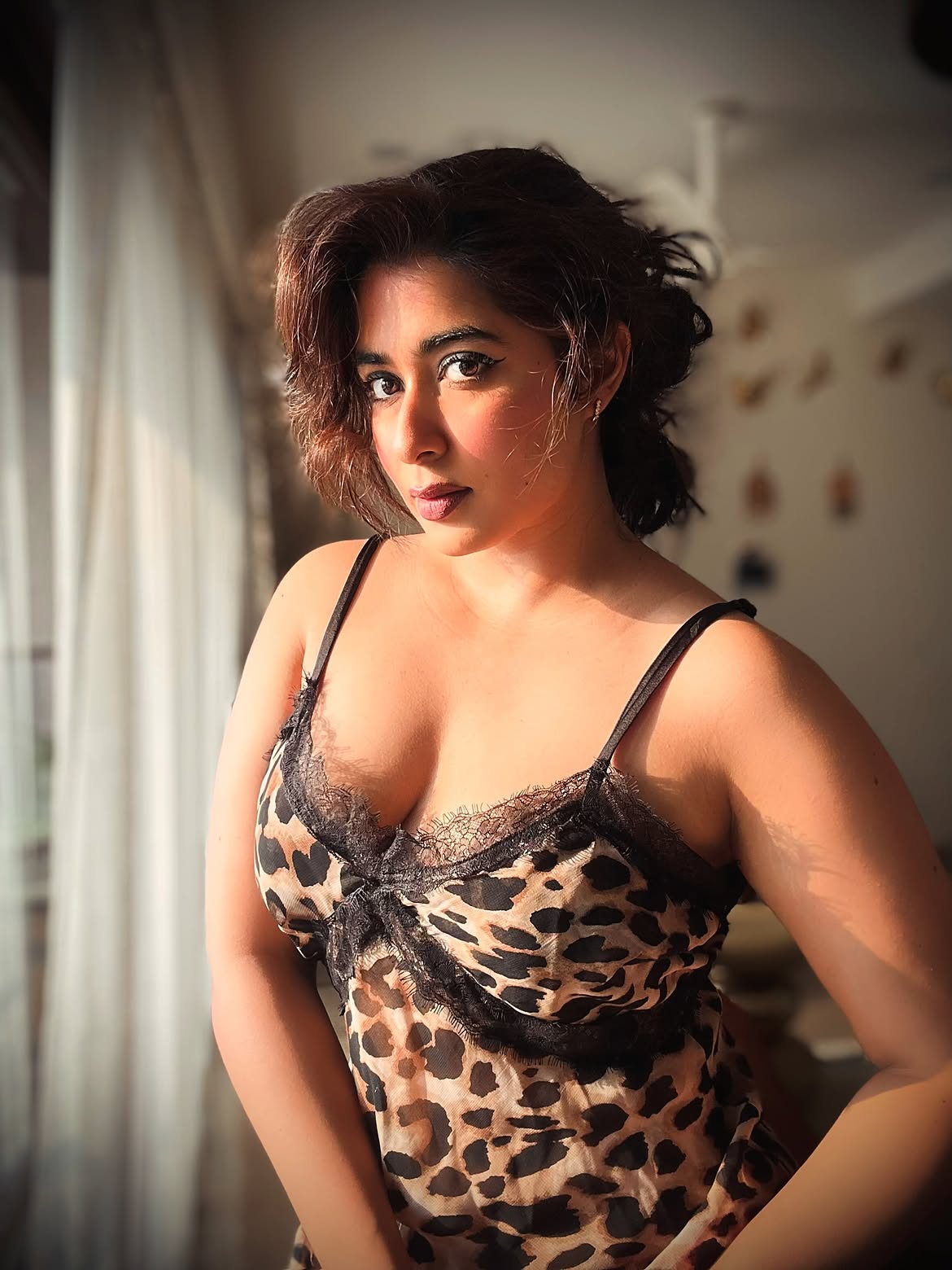 Nikita Sharma Shows Black Lace On Leopard Outfit