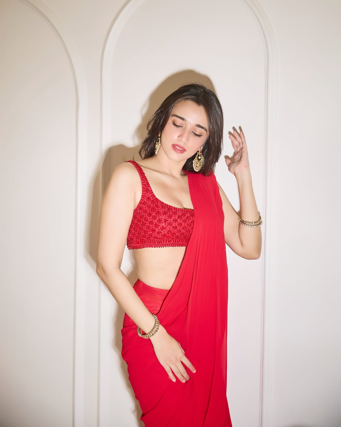 Nuveksha Styles Gold Earrings With A Red Saree!!