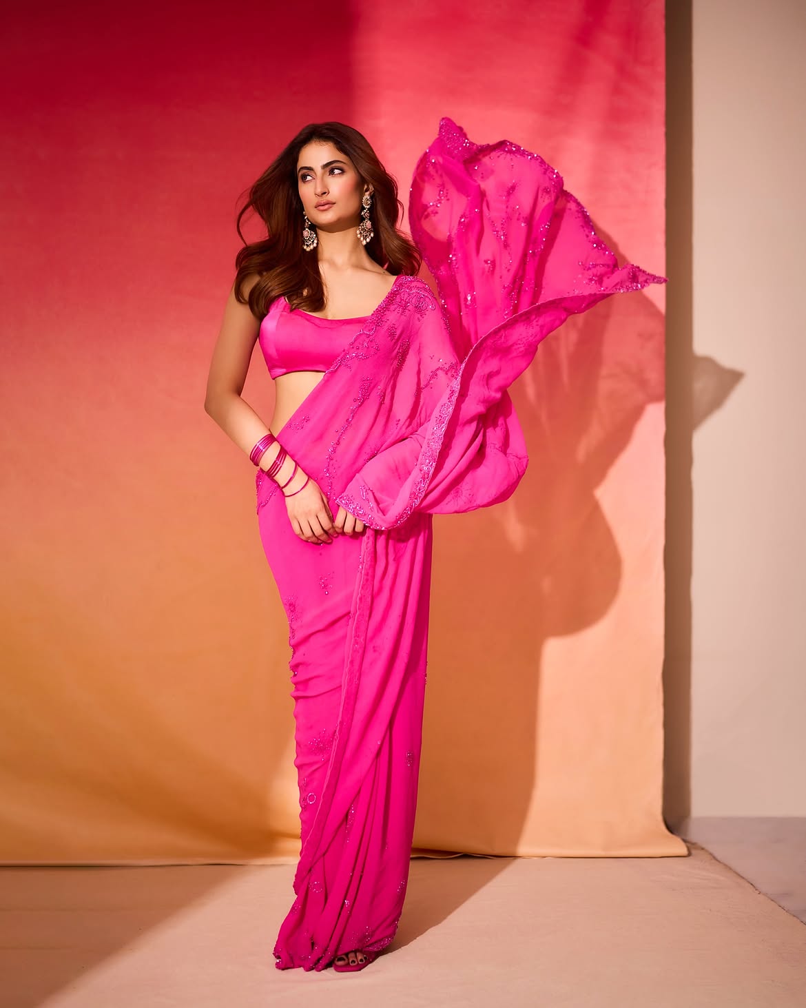 Palak Tiwari Poses In A Bright Pink Sequin Saree