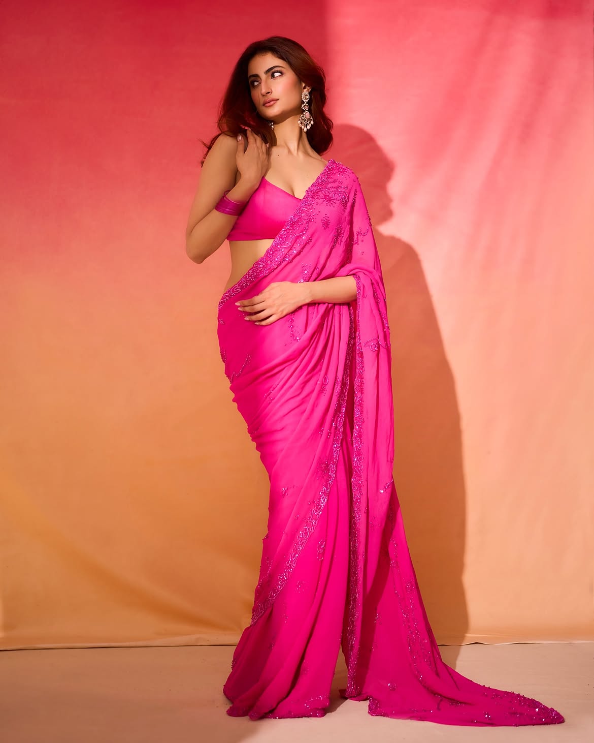 Palak Tiwari Twirls Her Flowing Fuchsia Saree!!!