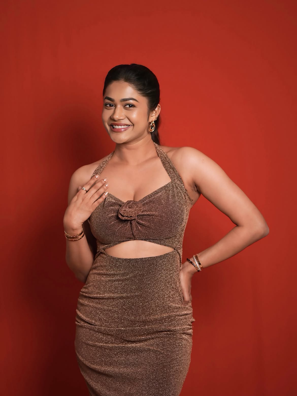 Payal Radhakrishna Smiles In Shimmering Bronze