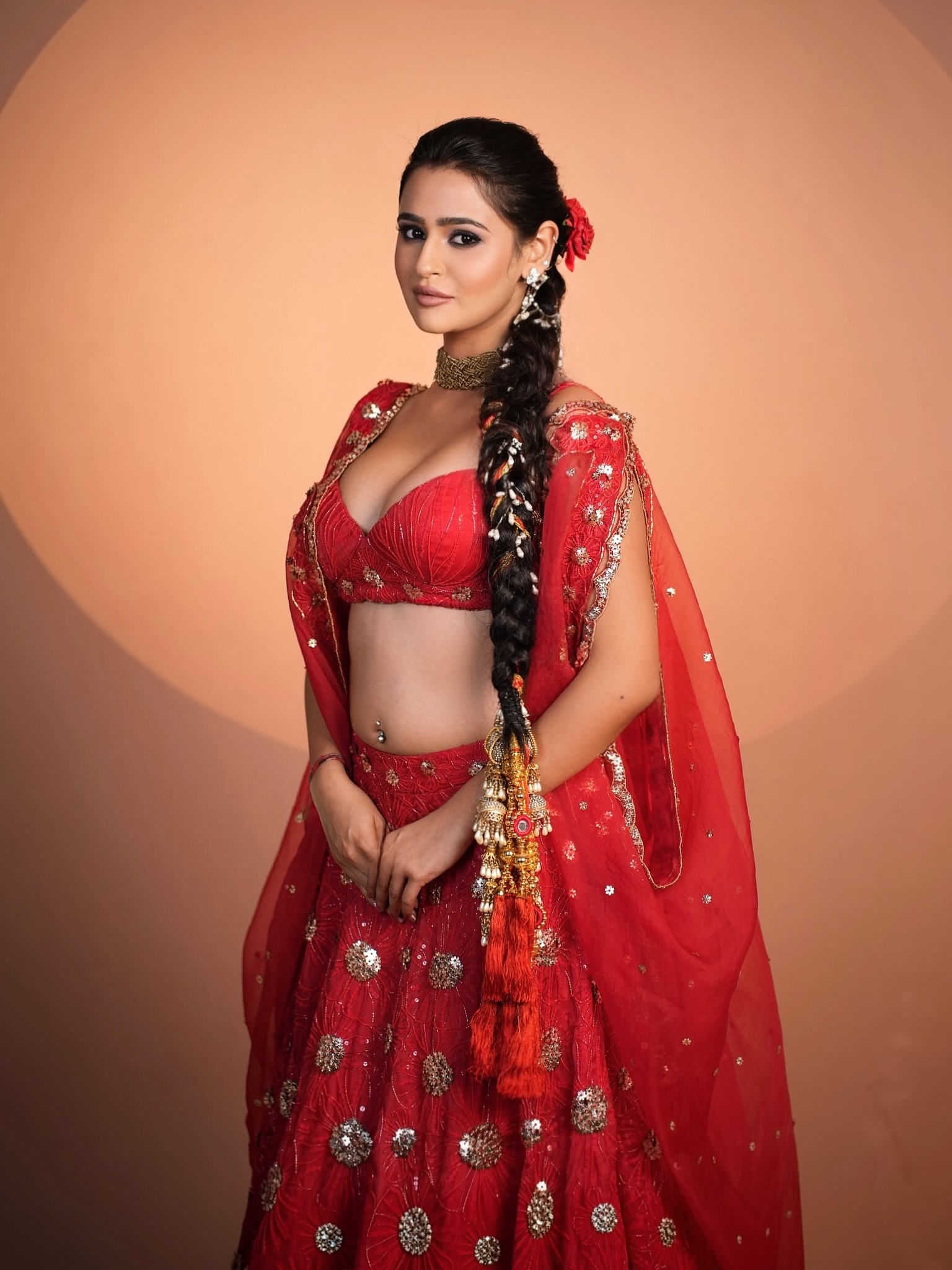 Prakriti Pavani In Red Lehenga With Floral Braid