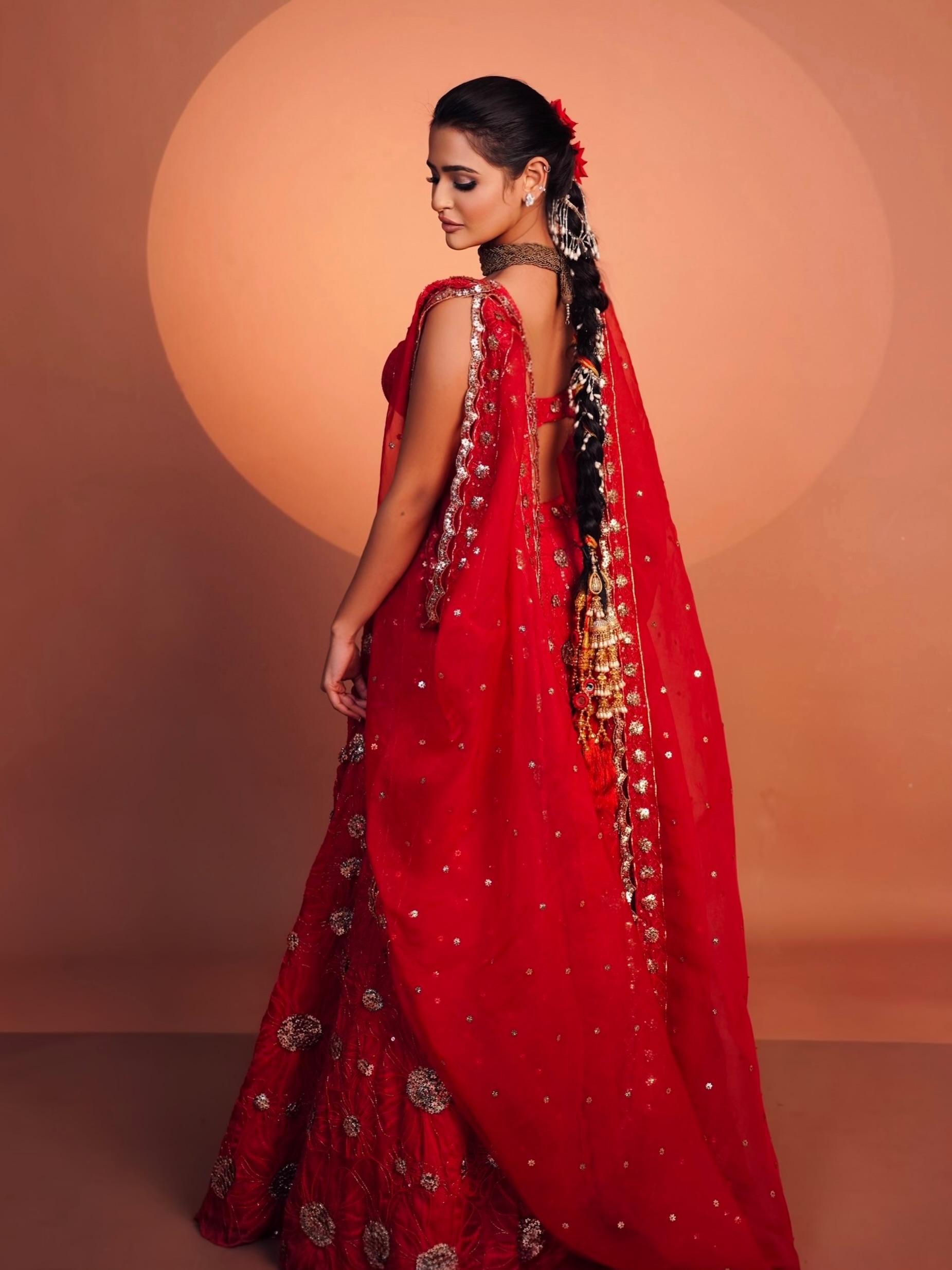 Prakriti Pavani Shows A Bold Red Choli Style Now