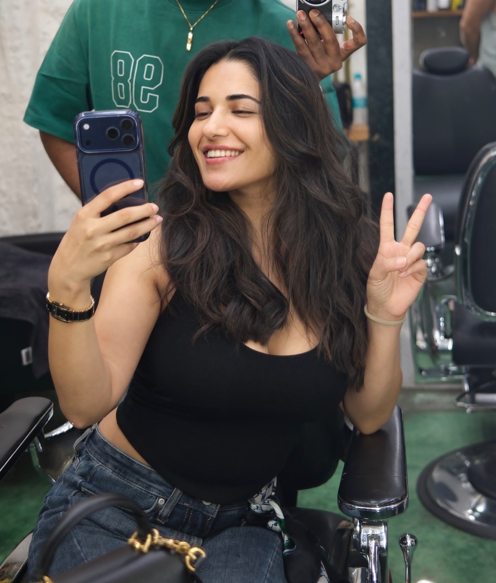 Ruhani Sharma Smiles With A Phone At The Salon!!
