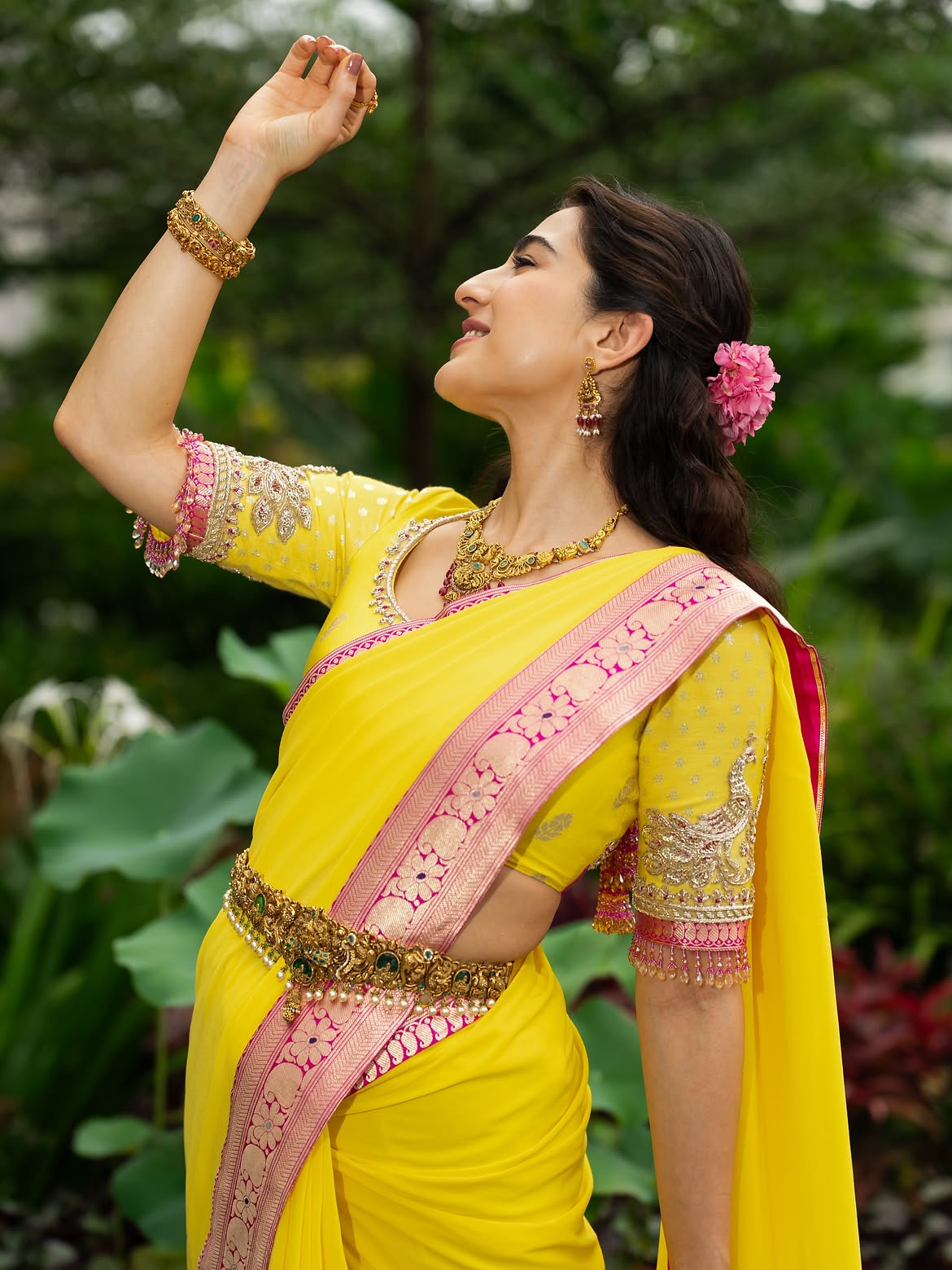 Sara Ali Khan Poses Outdoors In Her Yellow Saree