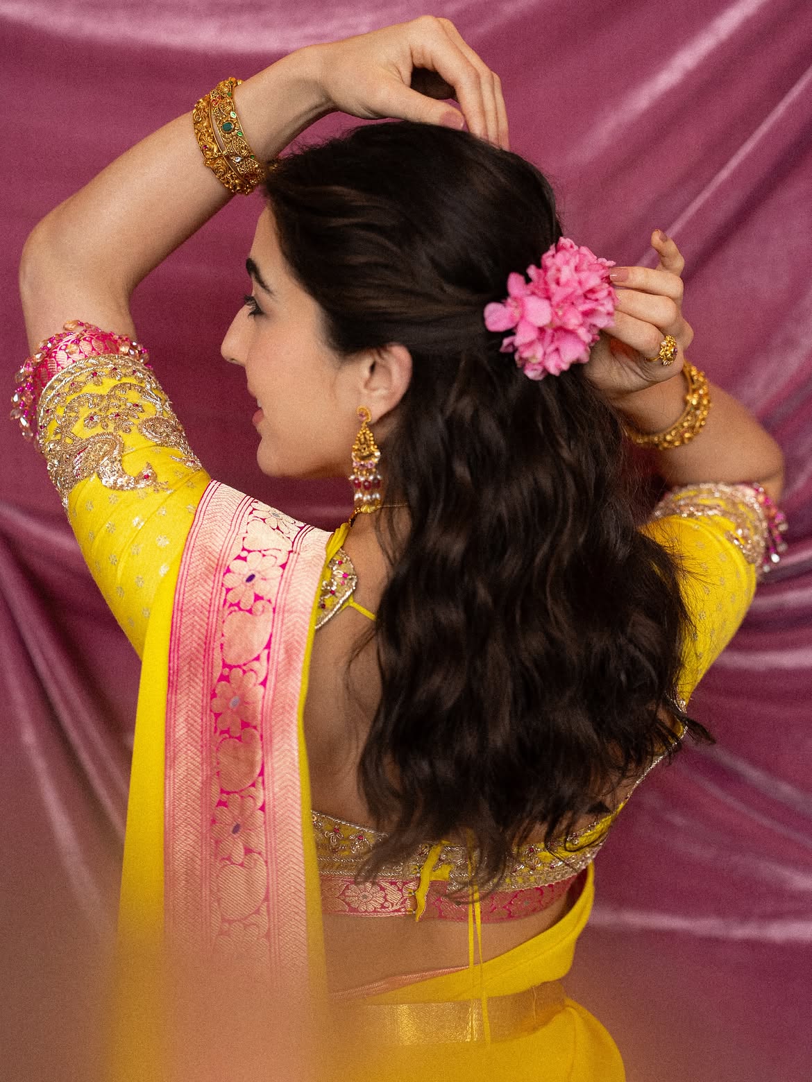Sara Ali Khan Adjusts Pink Flowers In Her Hairdo