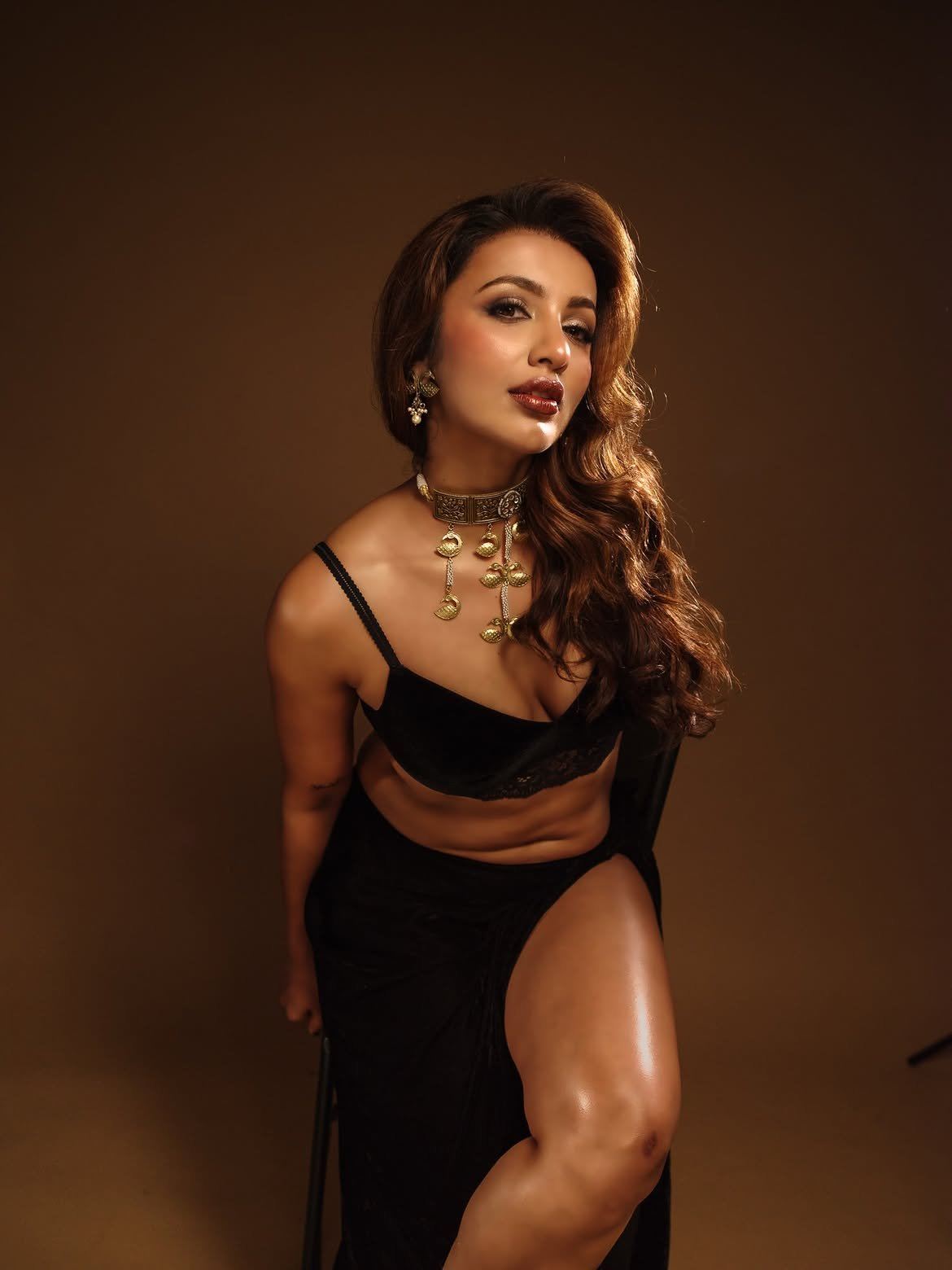 Tejaswi Madivada In Black With Regal Gold Choker