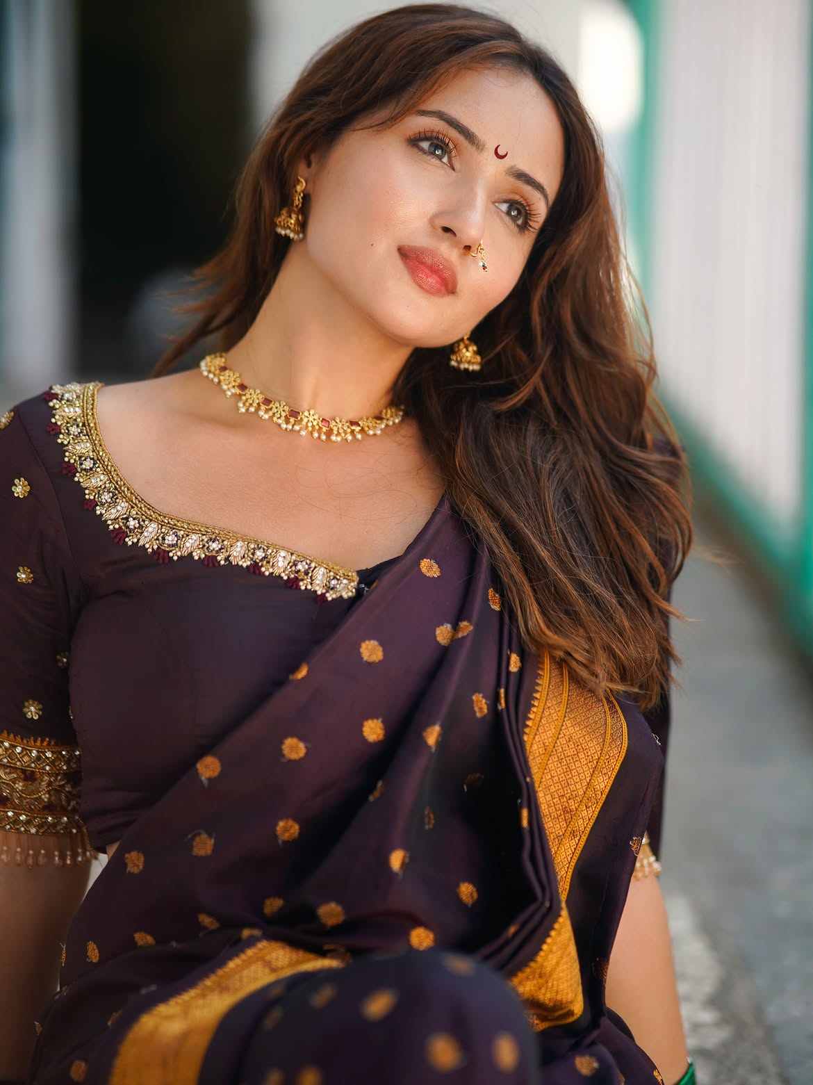 Varsha Rekhate Poses By Teal Rails In Dark Saree